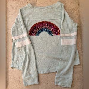 Super soft long sleeved top with rainbow embellishment